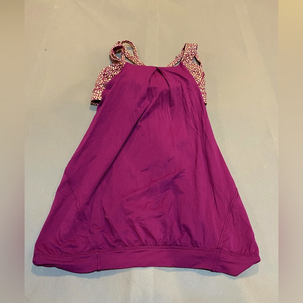 Lululemon Good used condition top with built in bra. Open back. Ask questions.